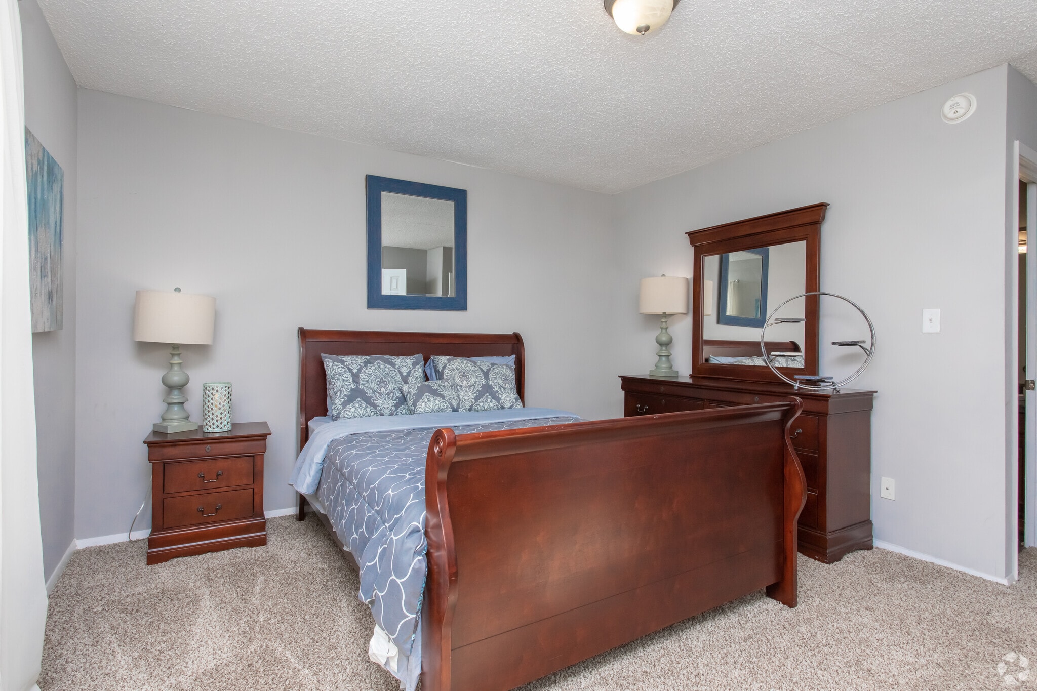 luxury bedroom at Riverstone at Powers Ferry apartments